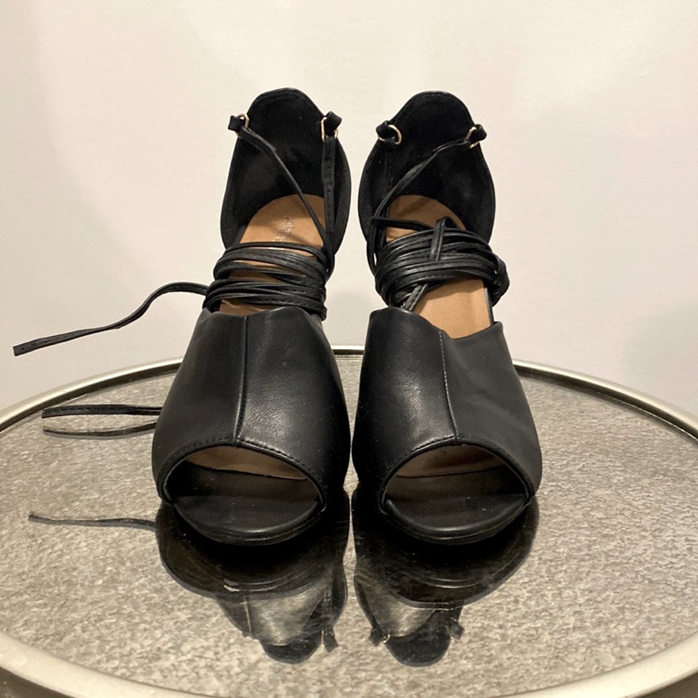 Strappy black heels